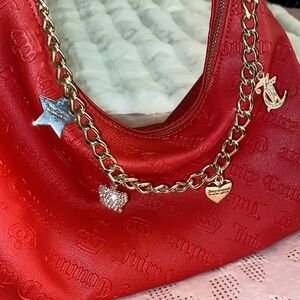 Red Juicy Couture purse with bling charms ❤️